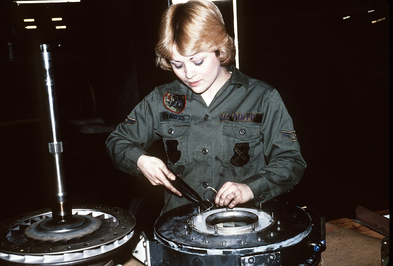 AIRMAN 1ST Class Demoss, a jet engine technician assigned to the 37th Component Repair Squadron, works on jet engine pa…